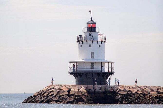 Afternoon Lighthouse Cruise Along the Coast of Portland Maine - Peaks Island landing and Fort Gorges: forts, ferry routes, and granite blocks